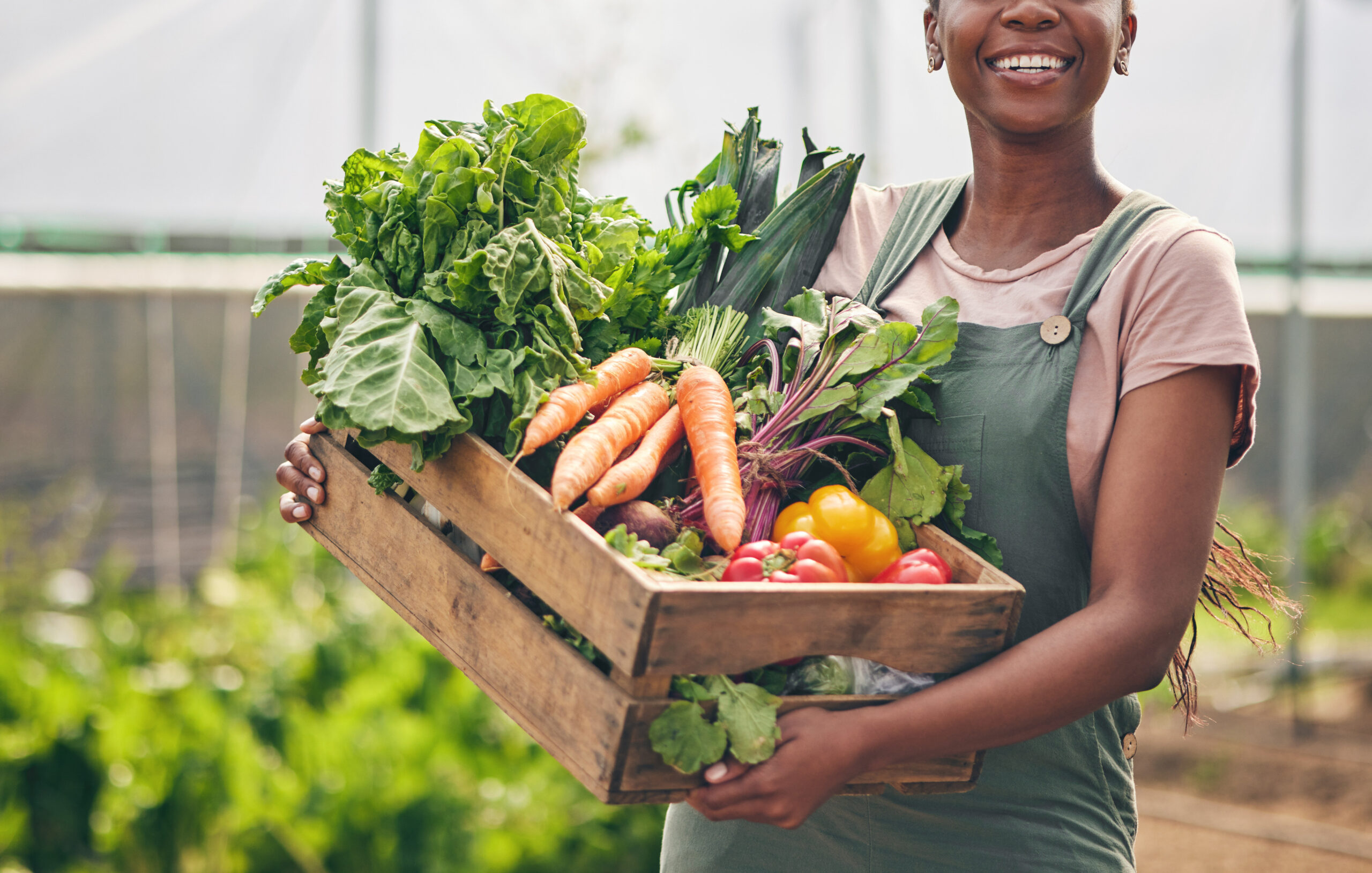 Ohawu Agricultural College student tending crops