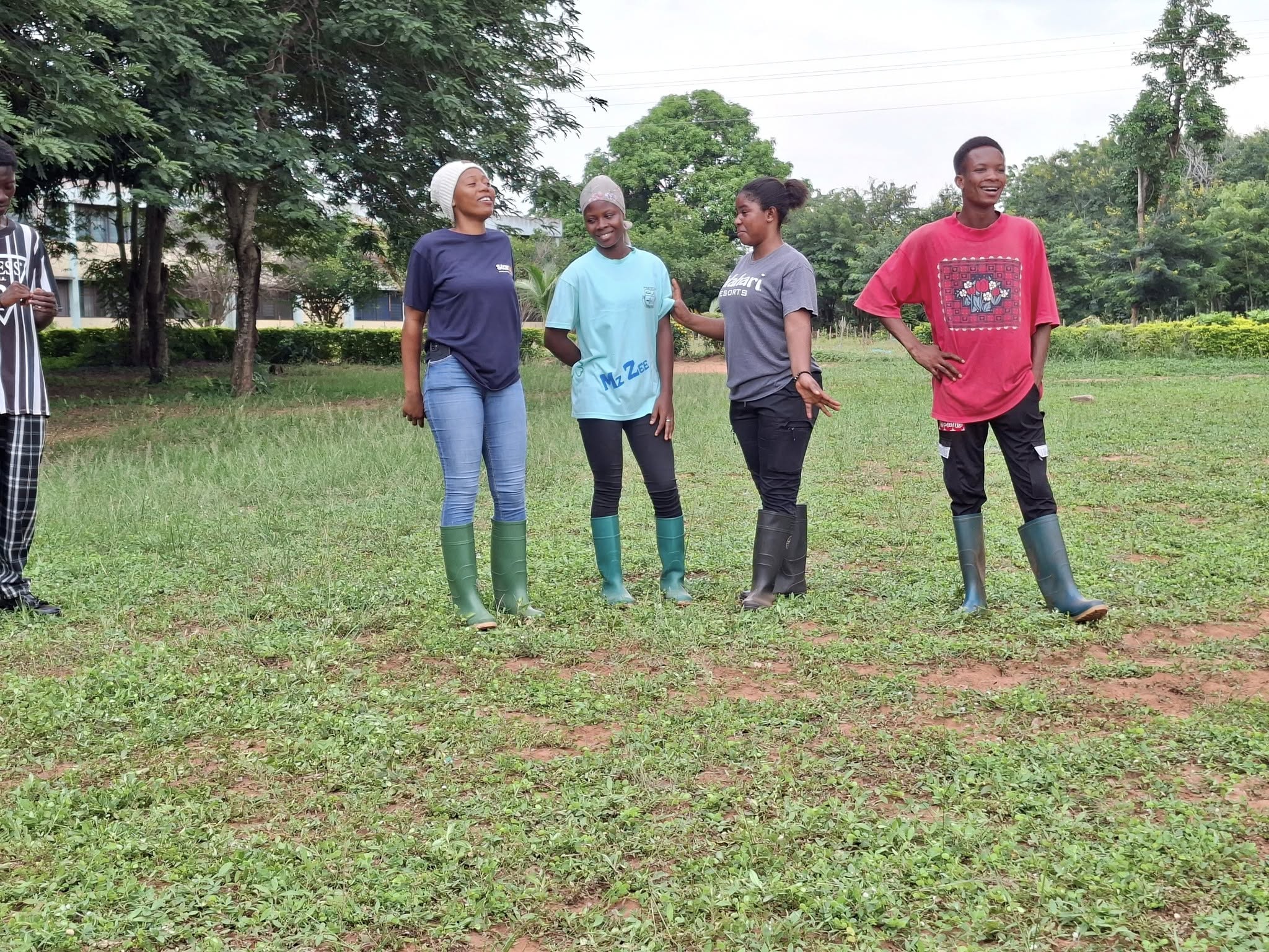 Ohawu Agricultural College student tending crops